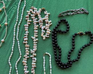Pearls and beaded necklaces and bracelets