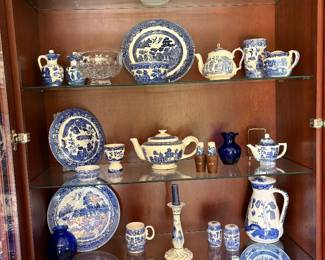 Blue oveal plates, cups, salt and pepper shakers and so much more!