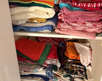 Closet full of linens including placemats and table cloths!