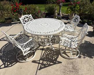 White Wrought Iron table and chairs