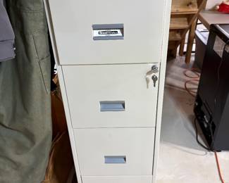Metal filing cabinet with keys