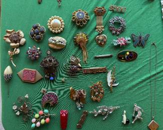Selection of women's broaches and pins