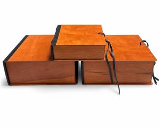 Three Book-Form Wood Keepsake Boxes with Black Spines and Leather Ties