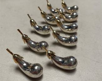 Ten Silverplate and Gold-Tone Eggplant Knife Rests