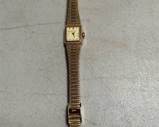 Geneva Ladies Quartz Watch with Champagne Dial and Textured Gold-Tone Bracelet