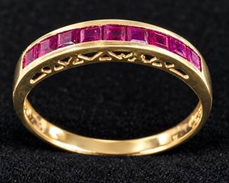 	10K Gold Band With Channel-Set Rubies
