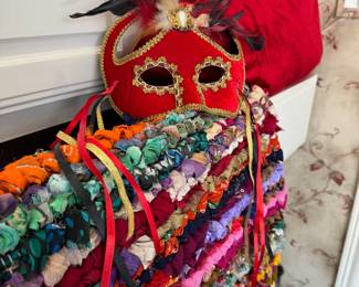 Colorful rug, mask and pillow