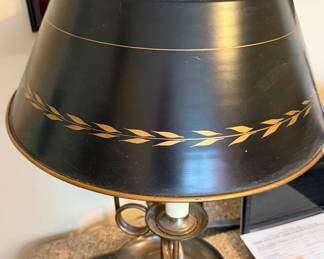 classic bouillotte lamp with a black and gold-painted metal (toleware) shade
