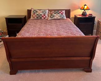 Beautiful sleigh bed with matching nightstands and dresser