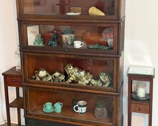 Four-tier wooden barrister (or lawyer) bookcase with Glass front Lift-up doors with oak finish- “The Globe-Wernickle Co”