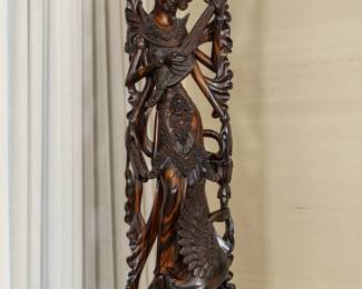 LOT 32 – Balinese 20th c. Ebony Figure of “Saraswati—the Hindu Goddess”. Balinese 20th c. tall, hand-carved ebony figure of “Saraswati” within a pierced surround. Beautiful artistry and exceptional craftsmanship. “Saraswati” is the Hindu goddess of knowledge, music, arts, learning and poetic inspiration. Acquired in Ubud, Bali in 1997. (~30” H. x 10” W.)