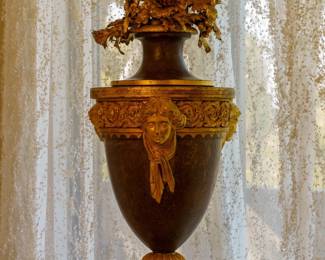 LOT 06 – Russian 18th c. Thule, Cast Iron Vase with Custom Pedestal. A Russian 18th c. Thule, cast iron vase of Neoclassical form with gilt bronze ormolu mounts, the body applied with a draped female mask. Supplied with its custom turning pedestal. Acquired from Galerie Perrin, Paris.