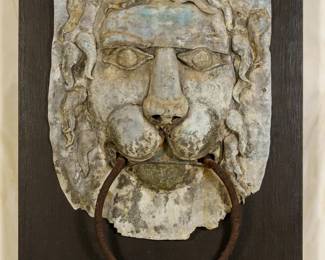 LOT 29 – French 18th c. Zinc, Lion Mask Door Knocker. French, 18th c. lion-mask door knocker in zinc, on ebonized wood backing. Acquired from James Grafstein Antiques in NYC, 2009.