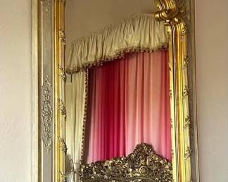 LOT 22 – French 19th c. Louis XV Style Trumeau Mirror. French 19th c. Louis XV style, large Trumeau wall mirror with modern glass in painted and giltwood; the arched plate beneath a carved rocaille cartouche within a trellis-ground frame.