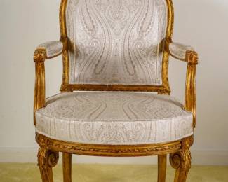 LOT 15 – French 19th c. Montgolfier Fauteuils, pair of chairs (in the style of 18th c. Georges Jacob). A pair of Montgolfier Fauteuils chairs, in the style of Georges Jacob (after the originals that are in the Louvre, France); hand-carved, painted and gilded, with oval padded backs and paisley upholstery.