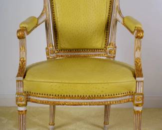 LOT 16 – French 18th c. Louis XVI Fauteuil Chairs (set of 4). French 18th c. set of four Louis XVI Fauteuils, carved, painted and parcel-gilt with fluted tapering legs and brass nailhead trim: upholstered in custom-dyed, rare ostrich skin. From L'Antiquare, NYC.