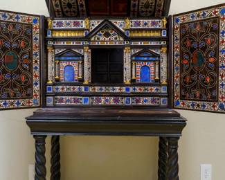 LOT 01 – Italian 18th c. Late Baroque Cabinet on Stand ("Milan Tax Chest"). An exceptional late Baroque cabinet-on-stand, the ebony and bone exterior opening to reveal an architectural interior of semi-precious stone inlay, rock crystal columns and gilt bronze ormolu. A cabinet of this ambition was made to display a collector's treasures. Acquired from Dalva Brothers, NYC.
