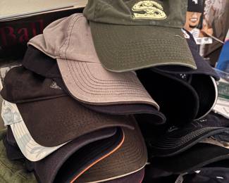Tons of white Sox hats 