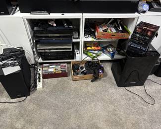 electronics, xbox ( not all of the cases have the games in them, the ones with games will be upstairs), sony blue ray players, dvd players, cassettes, speaker systems