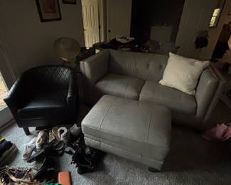 Modern loveseat with two black accent chairs, modern