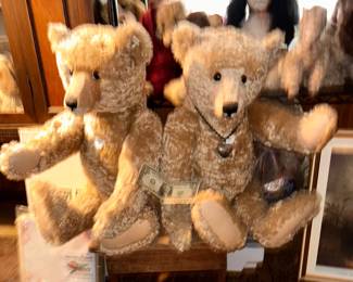 The classic Steiff 909 Replica Teddy Bears (~27" tall) , both have their ear tags nd their chest badges AND they feature a 'tilt' growler mechanism unit in their chest. 