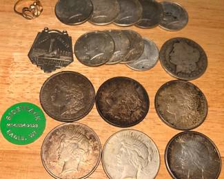 a selection of the coins at the sale. Morgan & Peace silver dollars, 90%, 40% and clad Kennedy half dollars, Hall of Science - Century of Progress 1933 insert badge, bar tokens...