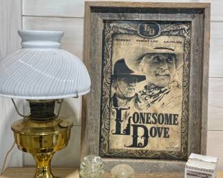 RUSTIC FRAMED CLINT EASTWOOD PICTURE, ANTIQUE ELECTRIFIED OIL LAMP WITH MILK GLASS SWIRL SHADE, OLD FASHIONED CUT NAILS IN ORIGINAL BOX, INSULATORS