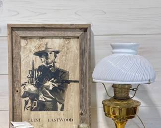 RUSTIC FRAMED CLINT EASTWOOD PICTURE, ANTIQUE ELECTRIFIED OIL LAMP WITH MILK GLASS SWIRL SHADE, OLD FASHIONED CUT NAILS IN ORIGINAL BOX