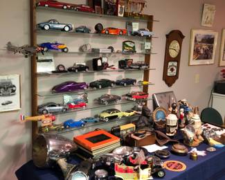 A large collection of die cast cars, automobiles of all sorts