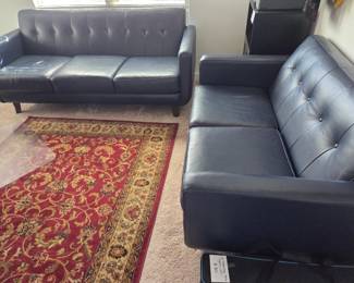 Oriental Rug and Leather Sofas