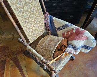 Old rocking chair with foot rest