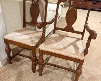 Pair of carved wood dining armchairs with upholstered seats