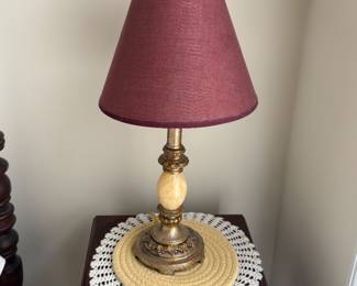 Brass and onyx table lamp with burgundy shade