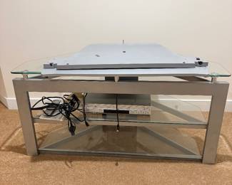 Silver metal and glass three tier TV stand