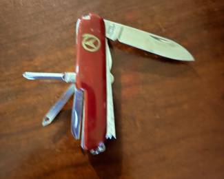 Red Swiss Army style multi tool pocket knife