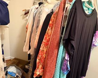 Women's clothing including tops, dresses, and cardigans