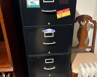 Black metal vertical file cabinet