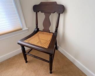 Antique mahogany side chair with woven cane seat