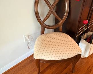 Wood dining side chair with crossed back and upholstered seat