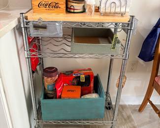 Chrome wire kitchen storage cart with butcher block top and bins
