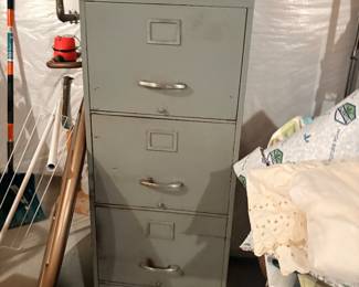 Gray metal vertical file cabinet