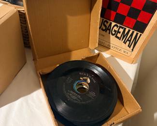Box of vintage 45 RPM vinyl records
