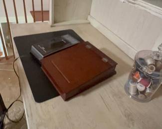 Wooden desk organizer box on desk mat
