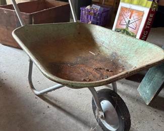 381 vintagegreenmetalwheelbarrow