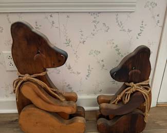 Pair of Handcrafted Folk Art Wooden Bears with Articulated Arms & Rope Bows