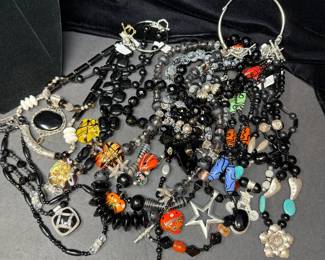 10 Pieces of Beaded Costume Jewelry Items in a Primarily Black and Smoky Gray Color Palette