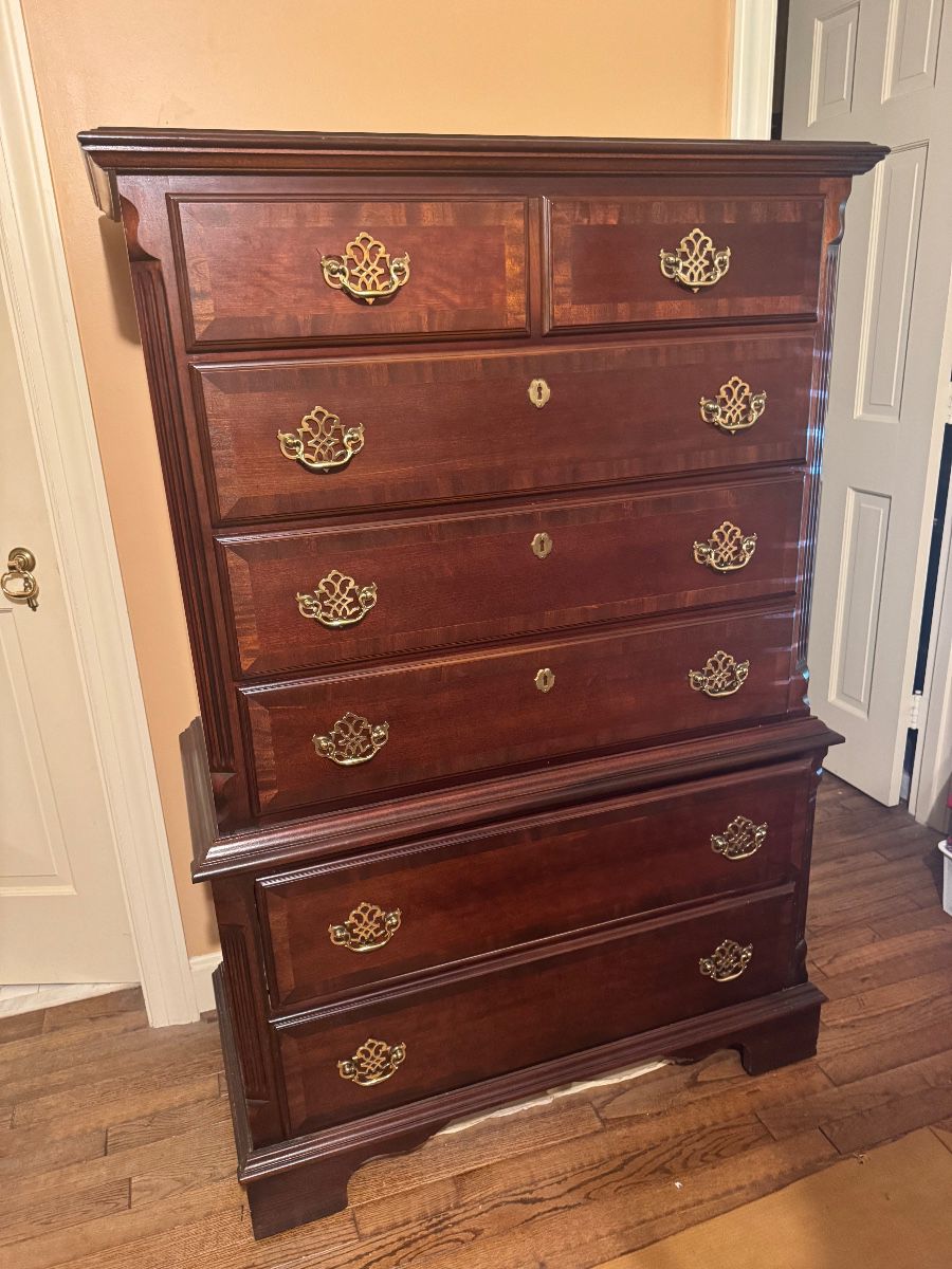 We have two of these lovely highboy dressers 