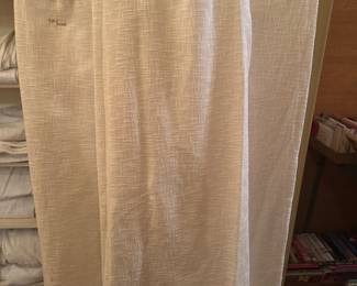 Several sets of 9 ft long curtain panels 