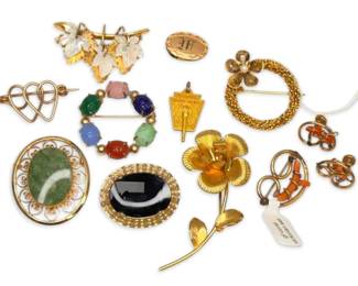 Scarab, Coral, And More Vintage And Antique Brooches