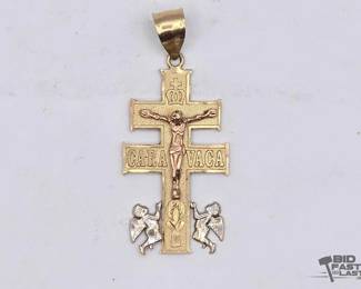 706  14kt Gold Religious Pendant
